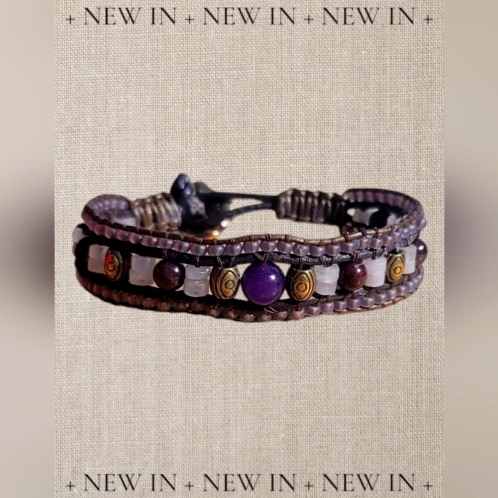 Attract love with this rose quartz and garnet beaded cuff bracelet.